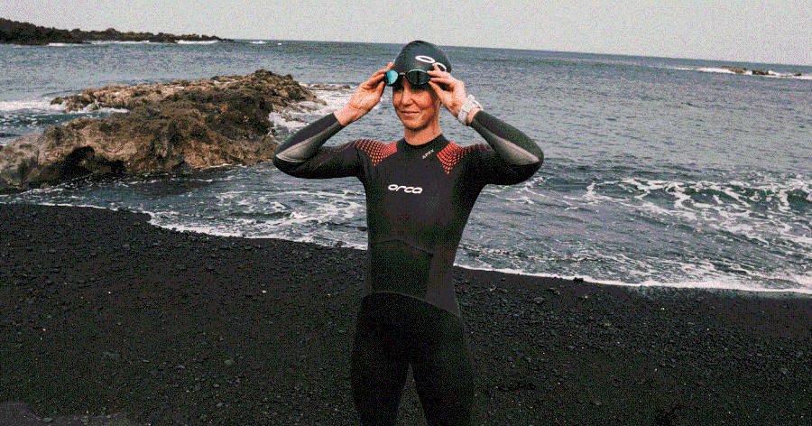 orca triathlon wetsuit for women on ocean shore