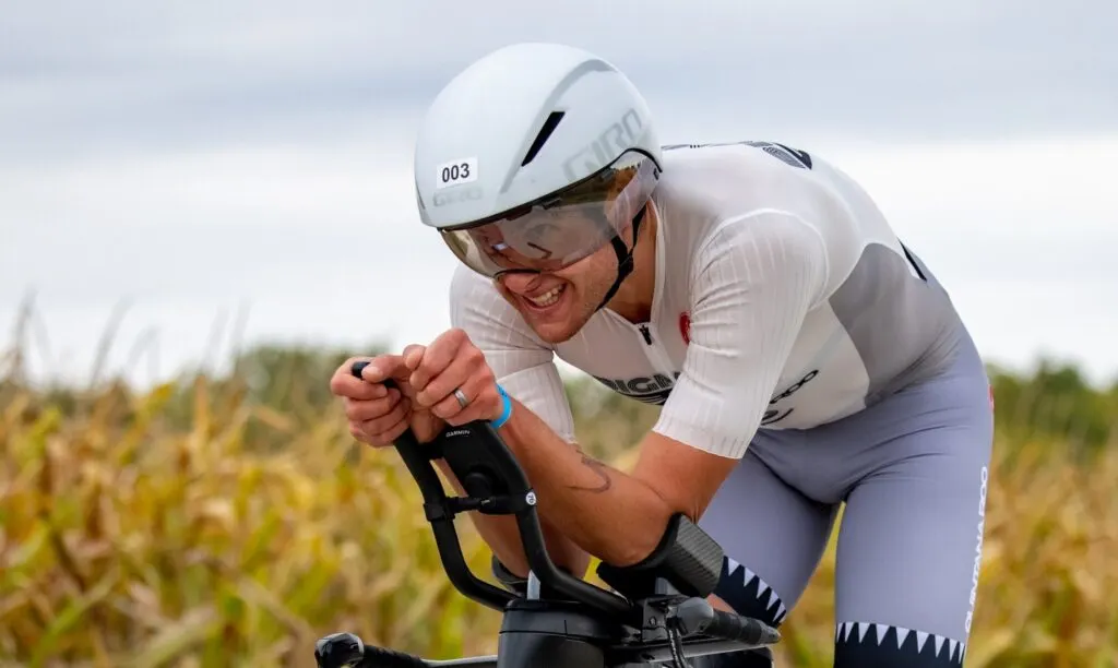 aerodynamic cyclist in a time trial helmet