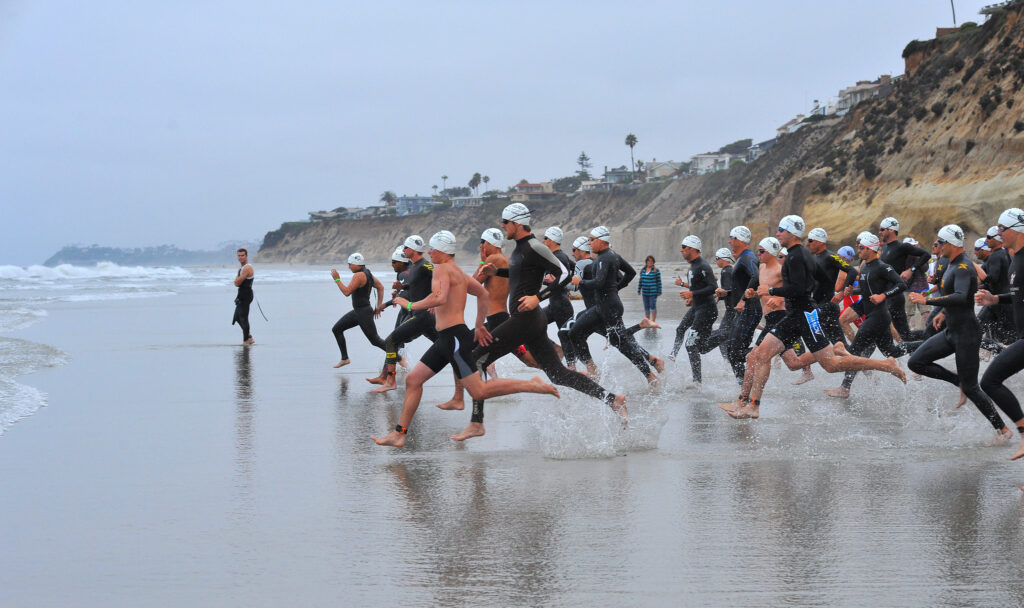 triathlete to Ironman entering the water